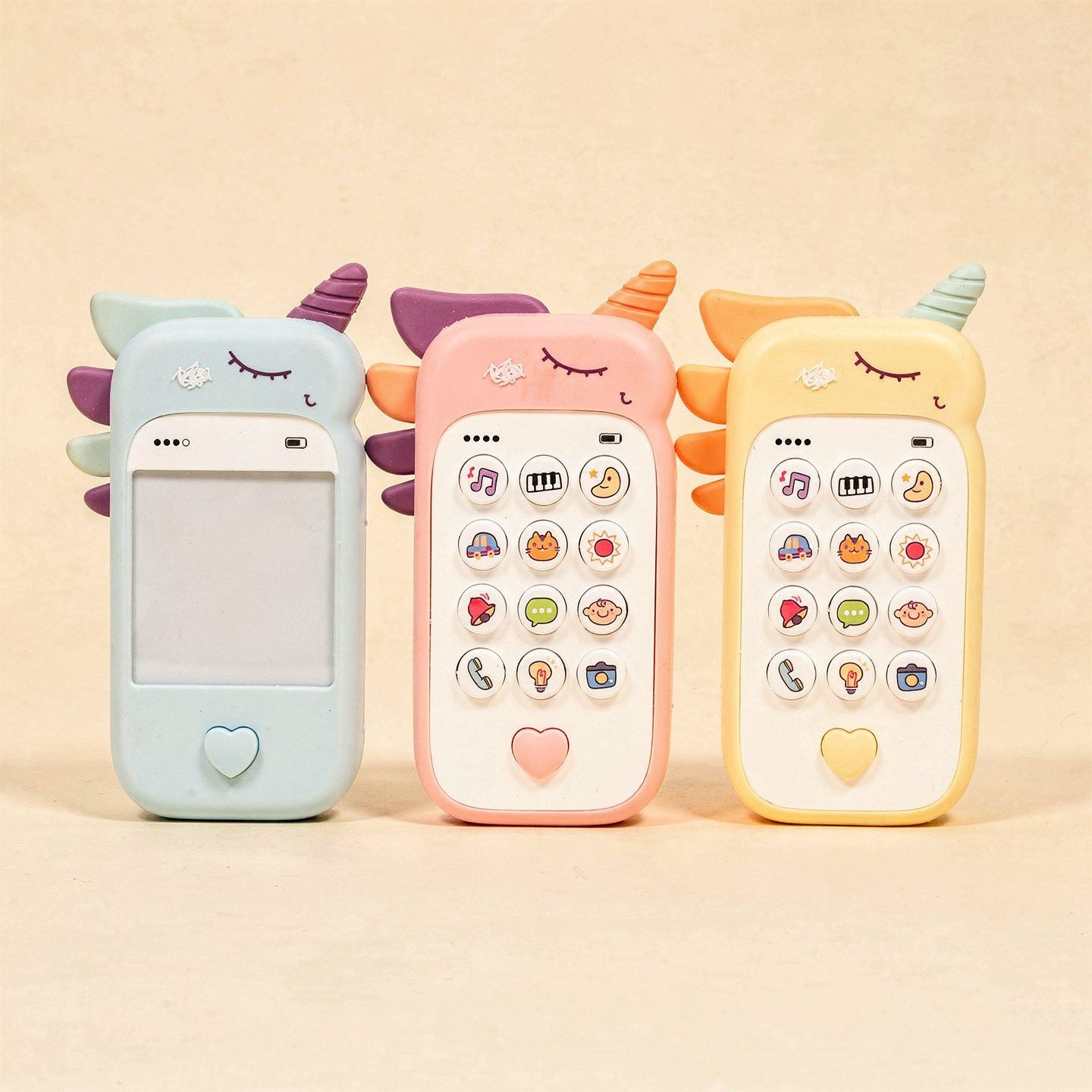 Blue, pink and yellow unicorn musical toy phones